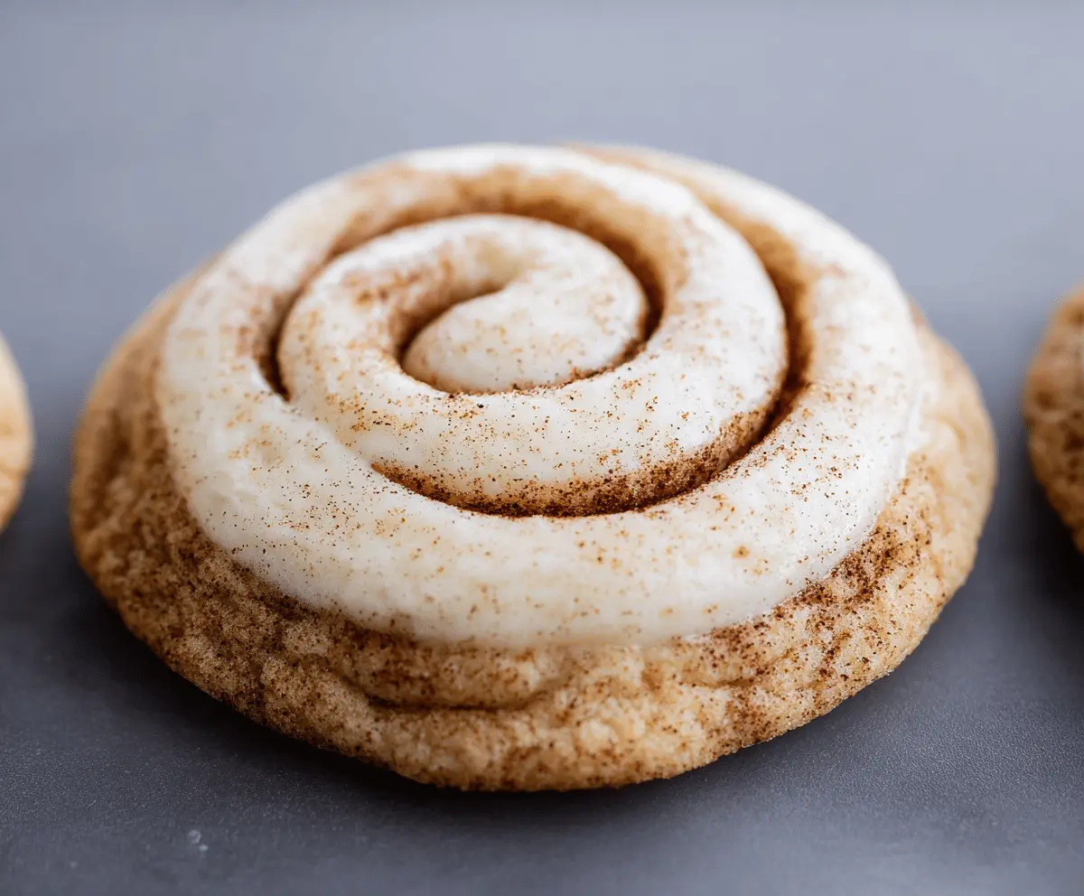 Delicious cinnamon roll cookie with swirled cinnamon filling and sweet glaze.