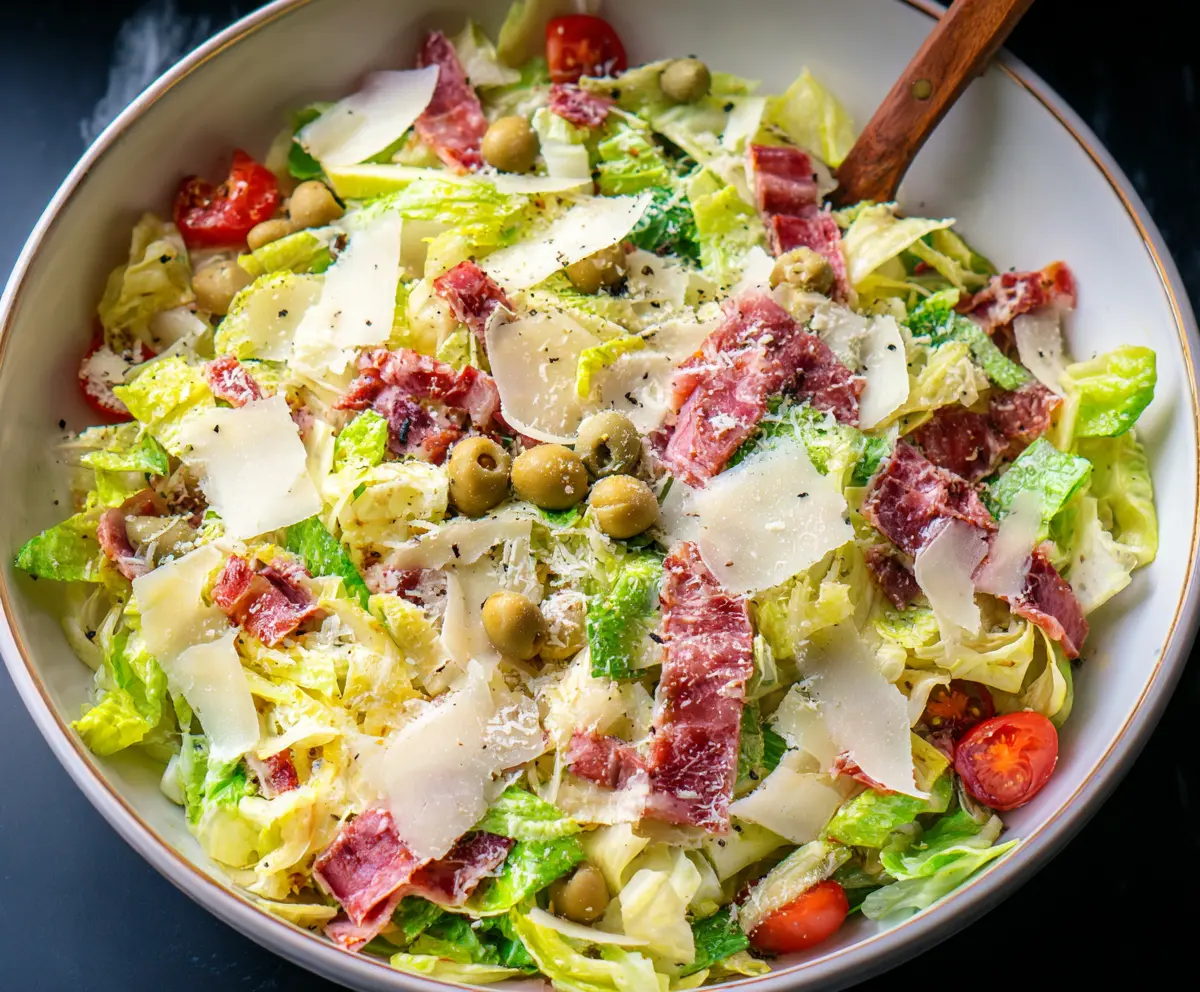 Colorful La Scala Chopped Salad with fresh vegetables and herbs on a plate.