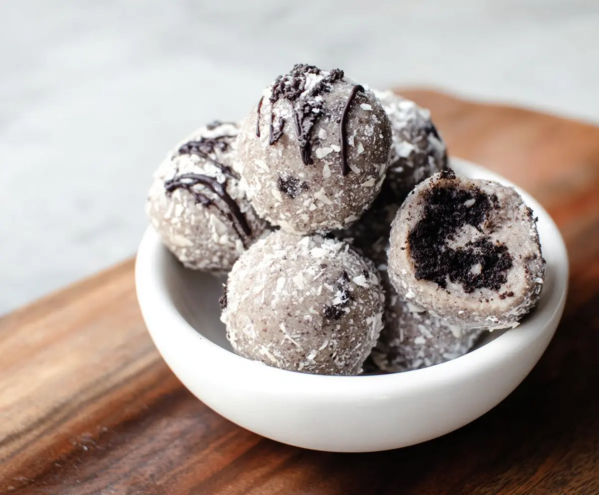 Healthy Oreo protein balls dip coated for a delicious snack