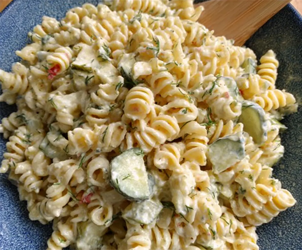 Delicious dill pickle pasta salad with fresh herbs and crunchy vegetables